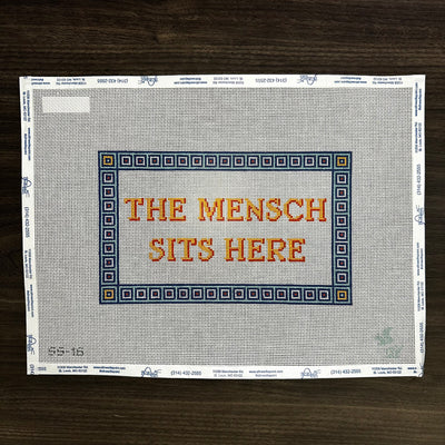 The Mensch Sits Here