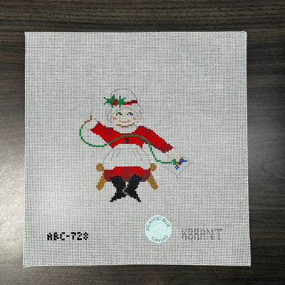 Needlepointing Mrs. Claus