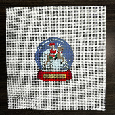 Santa Riding Reindeer Snow Globe